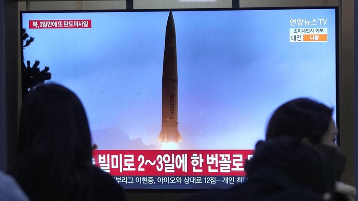 A TV screen shows a file image of North Korea's missile launch during a news program at the Seoul Railway Station in Seoul, South Korea, Sunday, March 19, 2023. North Korea launched a short-range ballistic missile toward the sea on Sunday, its neighbors said, ramping up testing activities in response to U.S.-South Korean military drills that it views as an invasion rehearsal. (AP Photo/Ahn Young-joon)