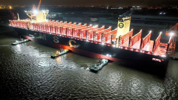 TAICANG, CHINA - MARCH 19: World's largest containership 'MSC Loreto' sets sail for sea trial from a shipyard of Jiangsu Yangzi-Mitsui Shipbuilding Co., Ltd on March 19, 2023 in Taicang, Suzhou City, Jiangsu Province of China. With a total length of 399.99 meters, a width of 61.3 meters and a maximum height of 78.1 meters above the keel, 'MSC Loreto' has a deck area of 24,000 square meters, and it can load 24,346 standard 20-foot containers at a time. (Photo by VCG/VCG via Getty Images)
