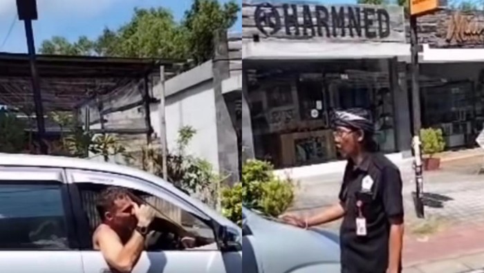 Pecalang di Pecatu menahan mobil bule yang berkendara di Labuan Sait saat perayaan Nyepi, sedangkan WNA itu diantar kembali ke penginapannya.