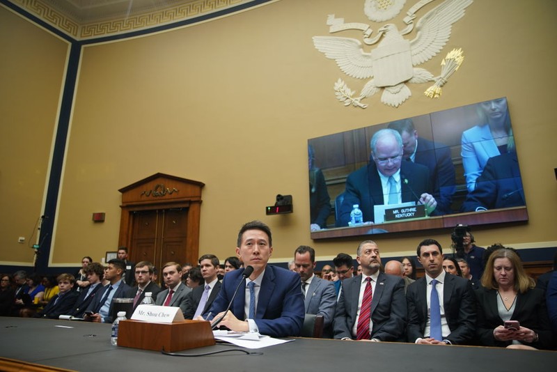 A TikTok branded backpack during a House Energy and Commerce Committee hearing in Washington, DC, US, on Thursday, March 23, 2023. TikTok's chief executive officer faced pointed questions about the app's relationship with its Chinese parent company in his debut appearance before Congress, where combative lawmakers made it clear they don't accept his promise to keep users and their data safe. Photographer: Al Drago/Bloomberg via Getty Images