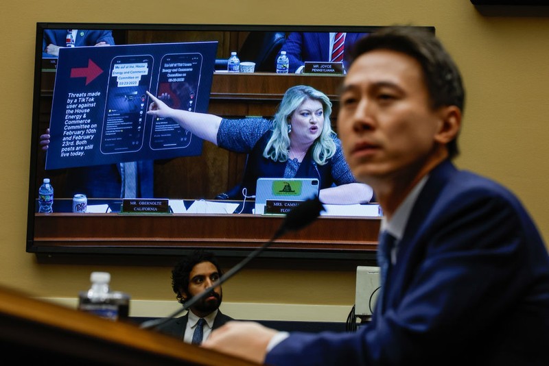 WASHINGTON, DC - MARCH 23: TikTok CEO Shou Zi Chew takes questions from Rep. Kat Cammack (R-FL) before the House Energy and Commerce Committee in the Rayburn House Office Building on Capitol Hill on March 23, 2023 in Washington, DC. The hearing was a rare opportunity for lawmakers to question the leader of the short-form social media video app about the company's relationship with its Chinese owner, ByteDance, and how they handle users' sensitive personal data. Some local, state, and federal government agencies have been banning the use of TikTok by employees, citing concerns about national security. (Photo by Chip Somodevilla/Getty Images)
