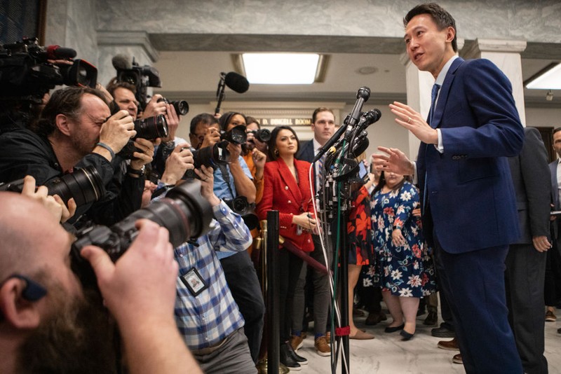 Shou Chew, chief executive officer of TikTok Inc., speaks to members of the media before a House Energy and Commerce Committee hearing in Washington, DC, US, on Thursday, March 23, 2023. The TikTok chief executive officer plans to tell Congress his app does more to protect young users than rival social media and that Beijing has no authority over its data, invoking familiar arguments to head off a US ban or forced sale. Photographer: Al Drago/Bloomberg via Getty Images