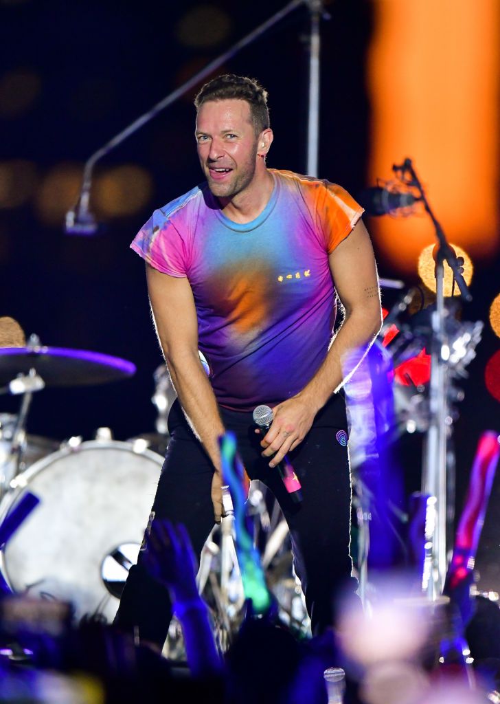 NEW YORK, NEW YORK - JUNE 17:  Chris Martin of Coldplay performs during pre-taping of the Macy's 4th of July Firework Show at Hunter's Point South Park on June 17, 2021 in New York City. (Photo by James Devaney/GC Images)