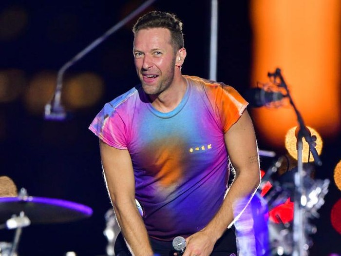 NEW YORK, NEW YORK - JUNE 17:  Chris Martin of Coldplay performs during pre-taping of the Macys 4th of July Firework Show at Hunters Point South Park on June 17, 2021 in New York City. (Photo by James Devaney/GC Images)