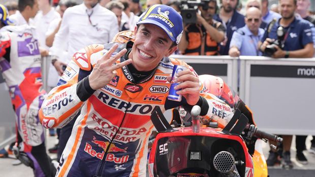 Spanish rider Marc Marquez of Repsol Honda Team celebrates after the MotoGP qualifying round for the Malaysia Motorcycle Grand Prix in Sepang International Circuit, Saturday, Oct. 22, 2022. Marquez took the third grid for the Sunday's race. (AP Photo/Vincent Thian)