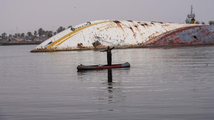 An aerial view of the 'Al-Mansur' yacht, once belonging to former Iraqi President Saddam Hussein, which has been lying on the water bed for years in the Shatt al-Arab waterway, in Basra, Iraq March 9, 2023.REUTERS/Mohammed Aty  NO RESALES. NO ARCHIVES