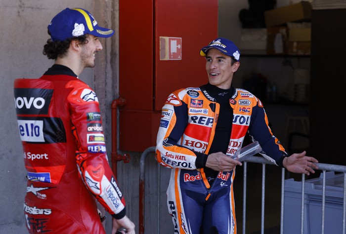 MotoGP - Portuguese Grand Prix - Algarve International Circuit, Portimao, Portugal - March 25, 2023 Repsol Honda Teams Marc Marquez after qualifying in pole position with second placed Ducati Lenovo Teams Francesco Bagnaia REUTERS/Marcelo Del Pozo