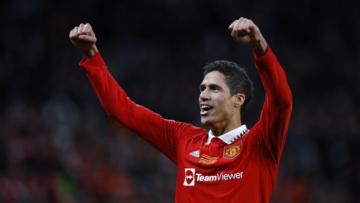 Soccer Football - Carabao Cup - Final - Manchester United v Newcastle United - Wembley Stadium, London, Britain - February 26, 2023  Manchester Uniteds Raphael Varane celebrates after winning the Carabao Cup final Action Images via Reuters/John Sibley EDITORIAL USE ONLY. No use with unauthorized audio, video, data, fixture lists, club/league logos or live services. Online in-match use limited to 75 images, no video emulation. No use in betting, games or single club /league/player publications.  Please contact your account representative for further details.