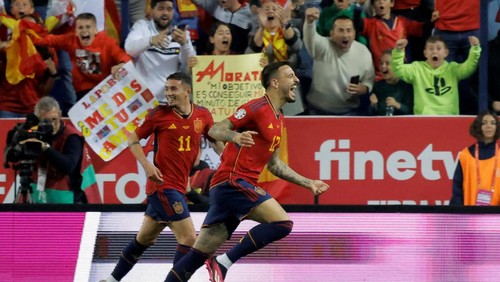 Soccer Football - UEFA Euro 2024 Qualifier - Group A - Spain v Norway - La Rosaleda Stadium, Malaga, Spain - March 25, 2023 Spains Joselu celebrates scoring their third goal with Yeremy Pino REUTERS/Jon Nazca