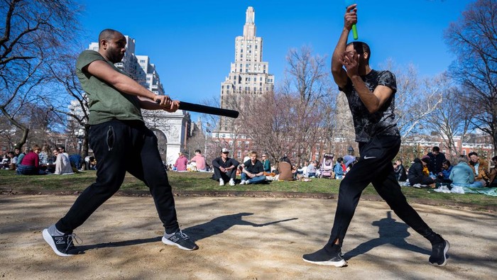 NEW YORK, NEW YORK - MARCH 26: People gather in Washington Square Park as temperatures reach above 60 degrees during the first weekend of spring on March 26, 2023 in New York City. In addition to unseasonably warm temperatures for March, the city is on pace for the least amount of fall-spring snowfall on record in more than 150 years, with only 2.3 inches measured in Central Park.  (Photo by Alexi Rosenfeld/Getty Images)