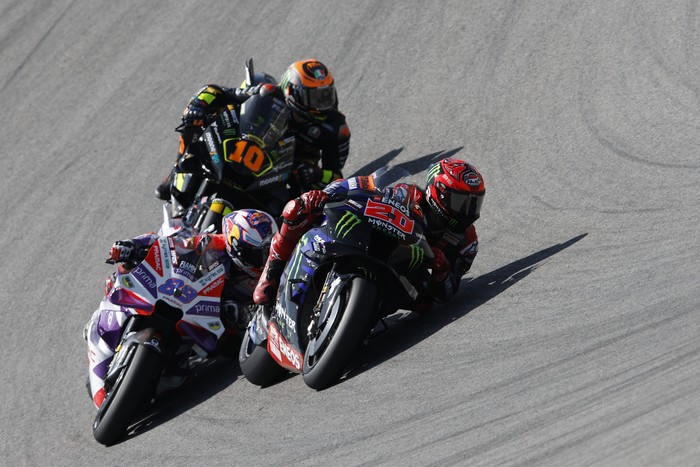 LAGOA, ALGARVE, PORTUGAL - MARCH 26: Fabio Quartararo of France and Monster Energy Yamaha MotoGP, Miguel Oliveira of Portugal and CryptoDATA RNF MotoGP Team, Luca Marini of Italy and Mooney VR46 Racing Team leads the field during the MotoGP Of Portugal - Race at Autodromo do Algarve on March 26, 2023 in Lagoa, Algarve, Portugal. (Photo by Joao Rico/DeFodi Images via Getty Images)