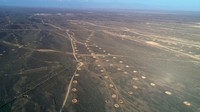 Pemandangan udara Gurun Karez di padang pasir di Hami, Provinsi Xinjiang, China, Minggu (26/3/2023).