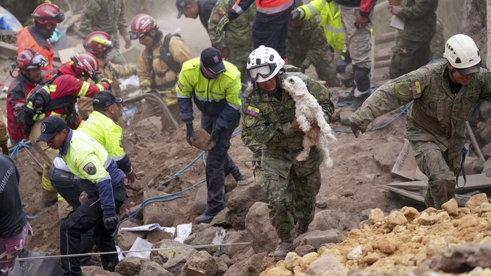 Some homes stand after a deadly landslide that buried dozens of homes in Alausi, Ecuador, Monday, March 27, 2023. (AP Photo/Dolores Ochoa)