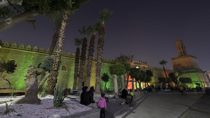 Muslim men perform ablution from the water before performing prayers inside al-Hakim bi-Amr Allah Mosque, named after the sixth Fatimid caliph, which reopened for visitors on Monday night after renovations in old Islamic Cairo, Egypt February 27, 2023. The renovation project for Egypt's fourth oldest mosque which its second largest, began in 2017 with a budget of 85 million Egyptian pounds (around 2.8 million USD) in collaboration between Egypt’s antiquities authority and Bohra Shia. REUTERS/Amr Abdallah Dalsh