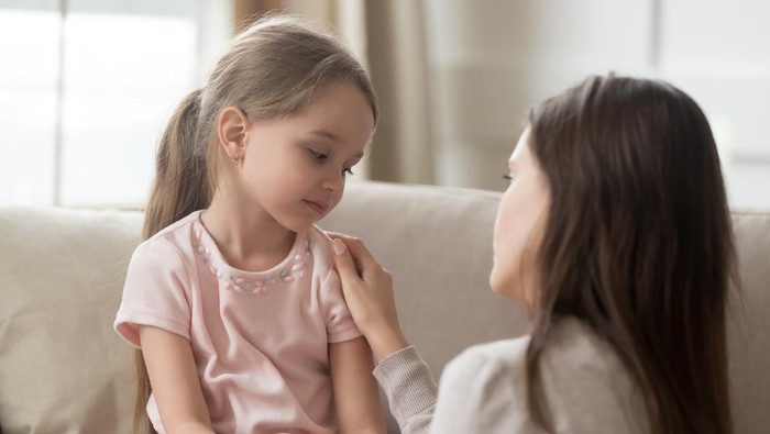 Loving worried mom psychologist consoling counseling talking to upset little child girl showing care give love support, single parent mother comforting sad small sullen kid daughter feeling offended