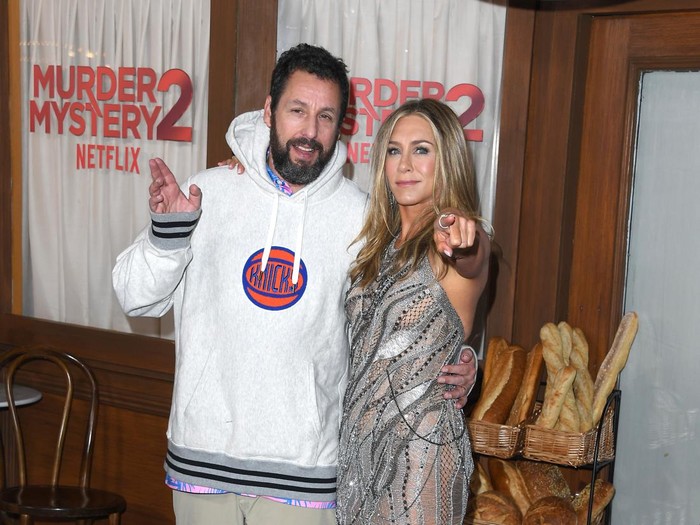 LOS ANGELES, CALIFORNIA - MARCH 28: Adam Sandler and Jennifer Aniston arrives at the Los Angeles Premiere Of Netflixs 