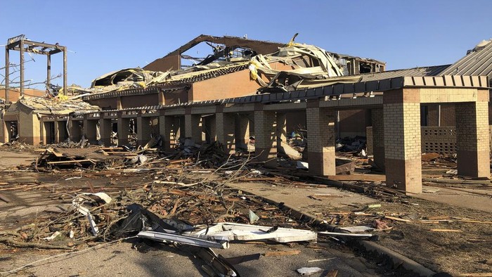 Wynne High school is damaged from Fridays severe weather in Wynne, Ark., on Saturday, April 1, 2023.  Unrelenting tornadoes that tore through parts of the South and Midwest that shredded homes and shopping centers. (AP Photo/Adrian Sainz)