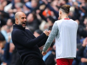 Selebrasi Heboh Guardiola di Depan Pemain Liverpool