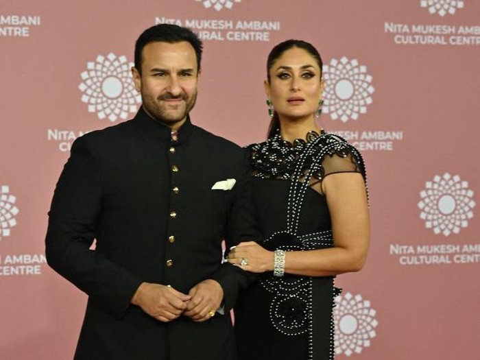 In this picture taken on April 1, 2023, Bollywood actors Saif Ali Khan (L) and Kareena Kapoor poses for pictures during the inauguration of the Nita Mukesh Ambani Cultural Centre (NMACC) at the Jio World Centre (JWC) in Mumbai. (Photo by SUJIT JAISWAL / AFP) (Photo by SUJIT JAISWAL/AFP via Getty Images)
