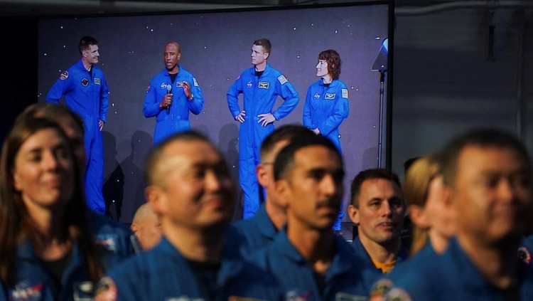 Astronauts Reid Wiseman, Victor Glover, Jeremy Hansen and Christina Koch, crew members of the Artemis II space mission to the moon and back, attend an NASA event in Houston, Texas, U.S., April 3, 2023. REUTERS/Go Nakamura