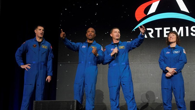 Astronauts Reid Wiseman, Victor Glover, Jeremy Hansen and Christina Koch, crew members of the Artemis II space mission to the moon and back, attend an NASA event in Houston, Texas, U.S., April 3, 2023. REUTERS/Go Nakamura