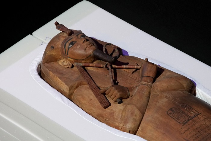 The Coffin of King Ramses II is on display during an unveiling ceremony in Paris, Monday, April 3, 2023, ahead of an exceptional exhibition running from 7 April to 6 Sept. 2023. (AP Photo/Christophe Ena)