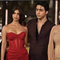 Kala itu penampilan mereka lebih modern dengan gaun dan jas. Foto: Getty Images