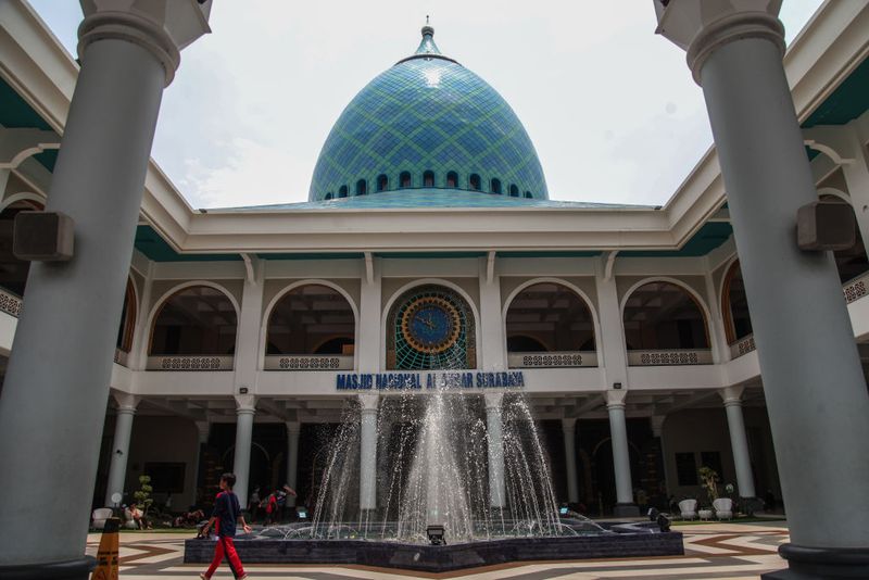 SURABAYA, INDONESIA - MARCH 10: A view of the Al Akbar National Mosque, one of Indonesia's largest mosques in Surabaya, East Java province, Indonesia on March 10, 2023. The mosque is the icon of the capital city of East Java province and has a capacity of up to 59,000 worshippers. The construction of the Al Akbar mosque began on August 1995, this mosque was just completed and inaugurated on November 2000 by the President of Indonesia at that time, Abdurrahman Wahid. The area of ââthe mosque, which is 147 meters long and 128 meters wide, is 22,300 square meters. The roof consists of a large dominating dome supported by four smaller domes and a minaret. (Photo by Suryanto/Anadolu Agency via Getty Images)