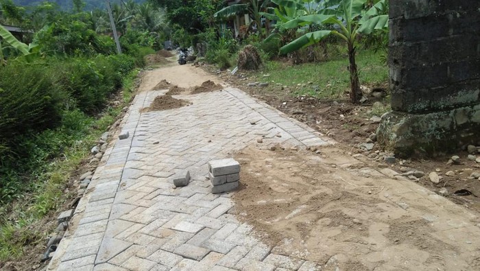 program pavingisasi di Desa Kandangan, Kecamatan Pesanggaran, Banyuwangi