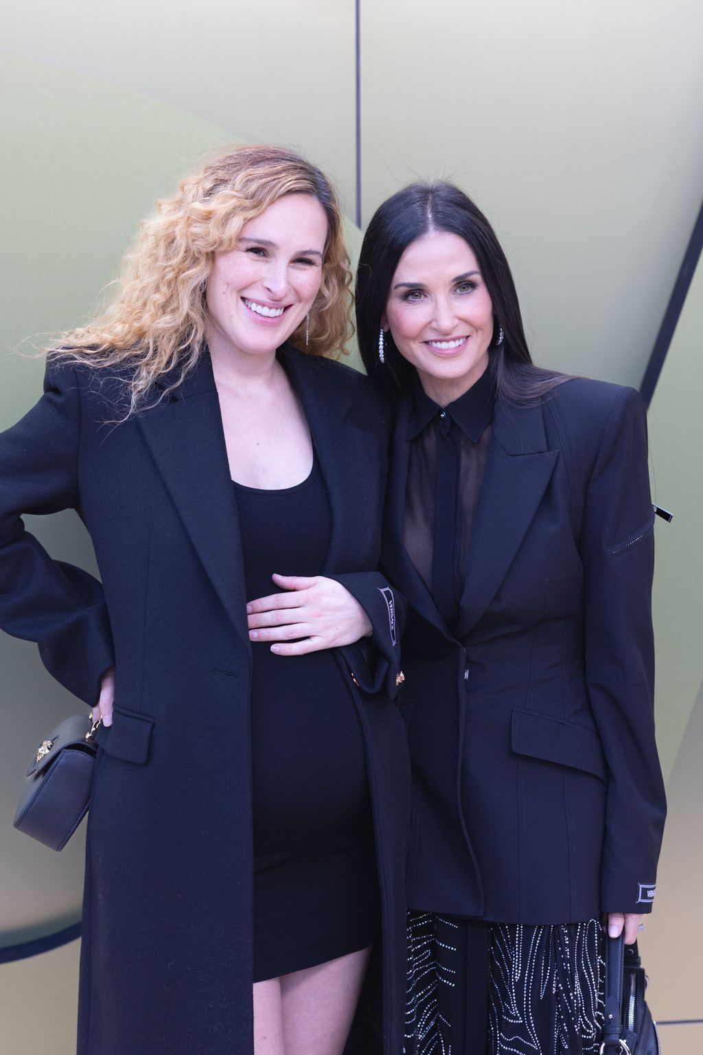 WEST HOLLYWOOD, CALIFORNIA - MARCH 09: Rumer Willis and Demi Moore at the Versace Fall-Winter 2023 Fashion Show held at Pacific Design Center on March 09, 2023 in West Hollywood, California. (Photo by Robert Smith/Patrick McMullan via Getty Images)