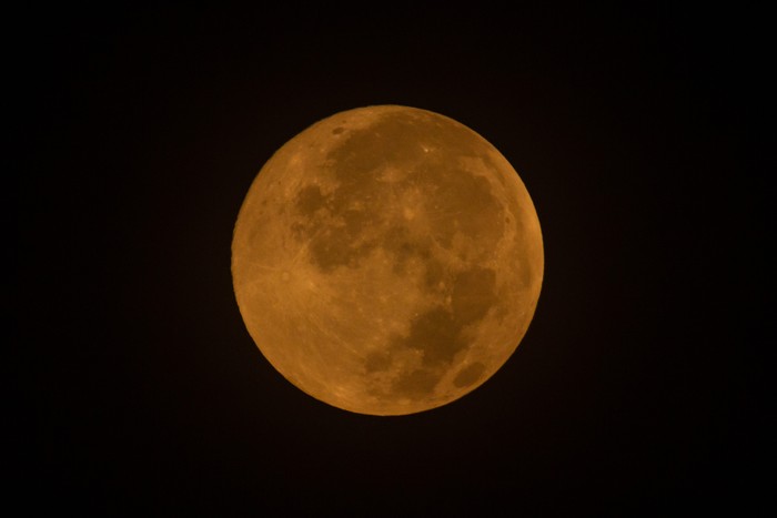UNGARAN, INDONESIA - APRIL 6: Full Pink Moon shines over the Al-Ikhlas Mosque in Ungaran, Central Java Province, Indonesia, in the early morning of April 6, 2023. (Photo by WF Sihardian/Anadolu Agency via Getty Images)