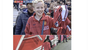 Fans cilik MU gembira karena mendapat jersey dari Rashford saat dia keluar lapangan karena cedera. Foto: Twitter