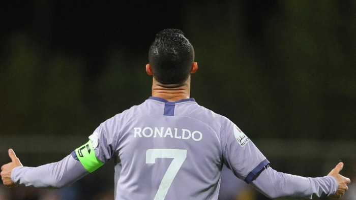 TOPSHOT - Nassrs Portuguese forward Cristiano Ronaldo reacts to a missed chance during the Saudi Pro League football match between Al-Fayha and Al-Nassr at the al-Majmaah stadium in the city of al-Majmaah on April 9, 2023. (Photo by Abdulaziz ALNOMAN / AFP) (Photo by ABDULAZIZ ALNOMAN/AFP via Getty Images)