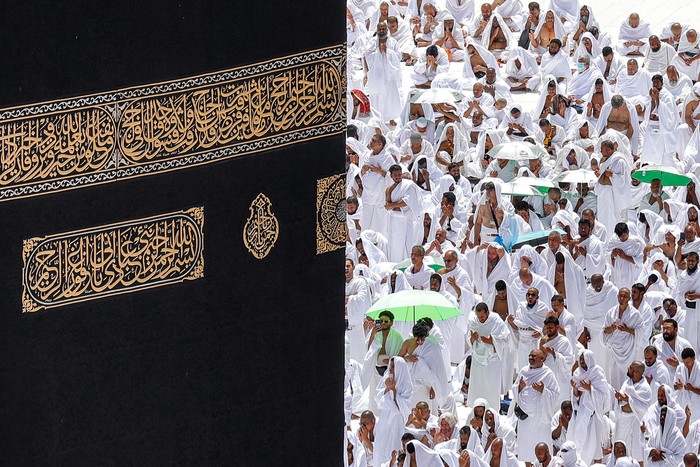 TOPSHOT - This picture taken on April 1, 2023 during the Muslim holy fasting month of Ramadan, from the Mecca Royal Clock Tower of the Abraj al-Bait skyscraper complex, shows an aerial view of Muslim worshippers around the Kaaba, the holiest shrine in the Grand Mosque complex in Saudi Arabias holy city of Mecca. (Photo by Abdel Ghani BASHIR / AFP) (Photo by ABDEL GHANI BASHIR/AFP via Getty Images)