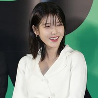 IU mengejutkan publik dengan penampilannya saat menghadiri konferensi pers film Dream pada Jumat (30/3/2023). Meskipun mengalami kenaikan berat badan, IU dinilai semakin awet muda. Foto: WireImage/Han Myung-Gu