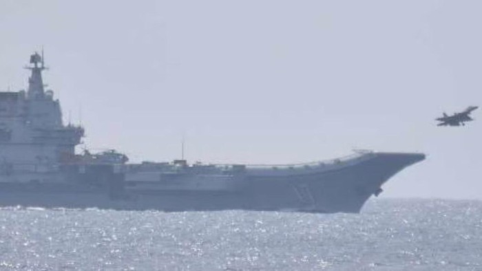 A jet fighter takes off from Chinas Shandong aircraft carrier, south of Okinawa prefecture, Japan, in this handout released by the Joint Staff Office of the Defense Ministry of Japan April 10, 2023. Joint Staff Office of the Defense Ministry of Japan/HANDOUT via REUTERS