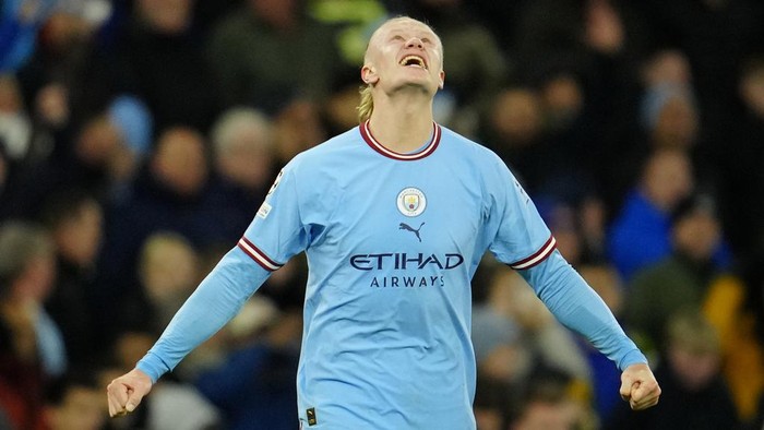 Manchester Citys Erling Haaland celebrates at the end of the Champions League quarterfinal, first leg, soccer match between Manchester City and Bayern Munich at the Etihad stadium in Manchester, England, Tuesday, April 11, 2023. Manchester City won 3-0. (AP Photo/Jon Super)
