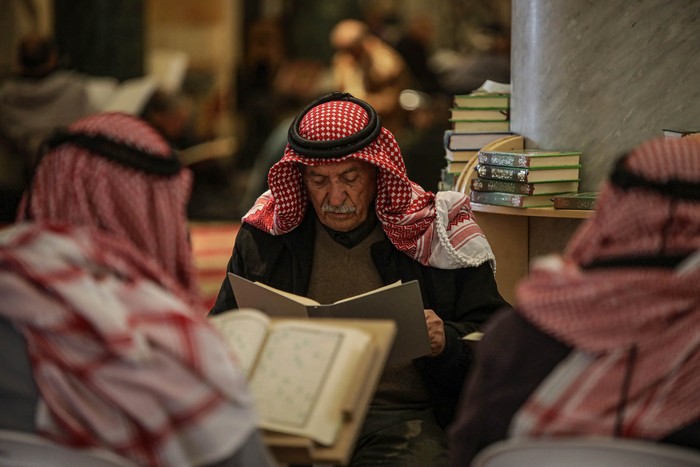 JERUSALEM, ISRAEL - 2023/04/11: A Muslim reads the Quran in Al-Aqsa Mosque, during the last ten days of the holy month of Ramadan, in which Muslims celebrate Laylat al-Qadr, the night of which cannot be determined with certainty. Muslims prepare to receive Laylat al-Qadr in the last 10 days of Ramadan. Laylat al-Qadr is a special night that is repeated every Hijri year in the blessed month of Ramadan. It is one of the last ten nights of Ramadan. It was mentioned in the Holy Quran and the biography of the Prophet Muhammad, so it is of great importance and privacy. (Photo by Saeed Qaq/SOPA Images/LightRocket via Getty Images)