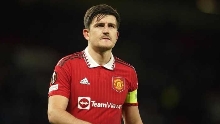 Manchester Uniteds Harry Maguire walks off the pitch after the Europa League first leg quarterfinal soccer match between Manchester United and Sevilla at the Old Trafford stadium in Manchester, Thursday, April 13, 2023. (AP Photo/Dave Thompson)