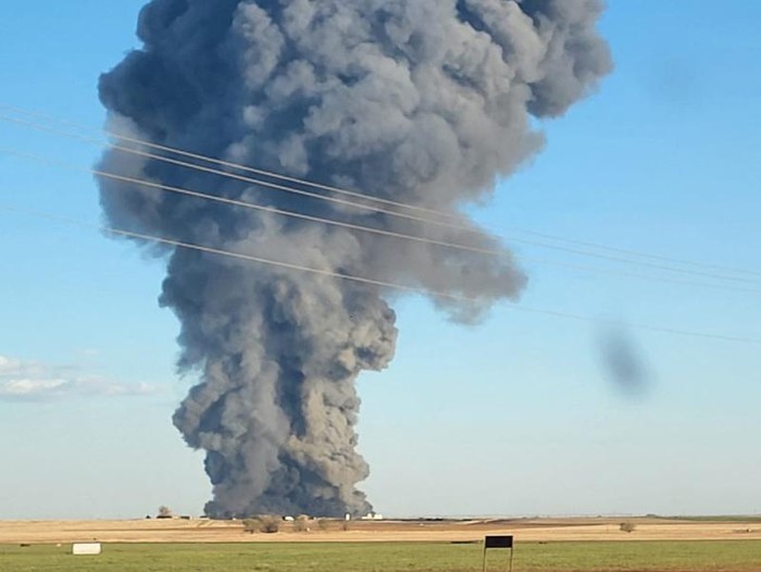 This image obtained from the Facebook page of Castro County Sheriffs Office shows a plume of smoke rising from the Southfork Dairy Farms, after an explosion and a fire killed around 18,000 cows, near Dimmitt, Texas April 11, 2023. — AFP pic