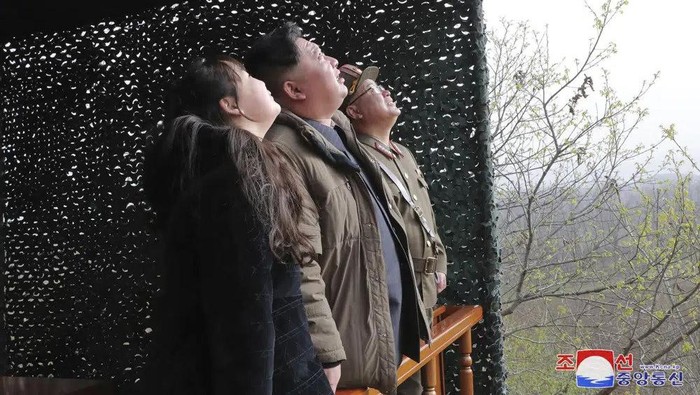 This photo provided April 14, 2023, by the North Korean government, shows North Korean leader Kim Jong Un, center, his daughter, inspect what it says is the test-launch of Hwasong-18 intercontinental ballistic missile Thursday, April 13, 2023 at an undisclosed location, North Korea. Independent journalists were not given access to cover the event depicted in this image distributed by the North Korean government. The content of this image is as provided and cannot be independently verified. Korean language watermark on image as provided by source reads: 