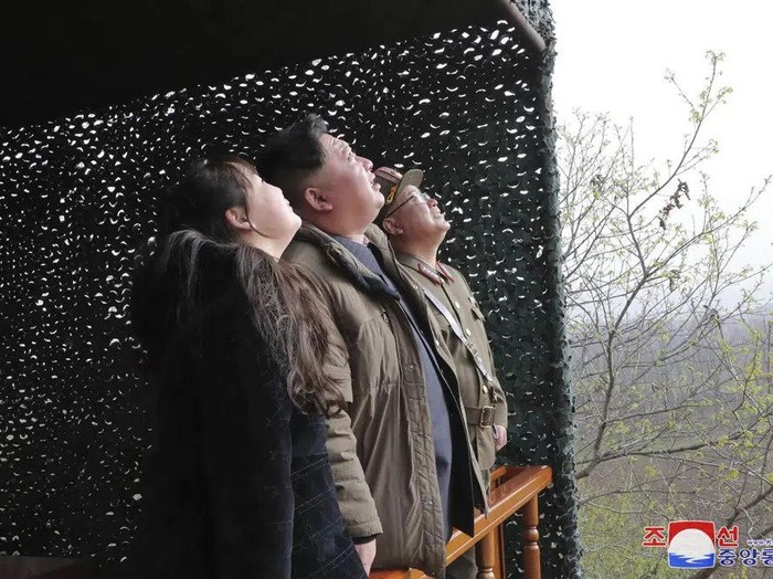 This photo provided April 14, 2023, by the North Korean government, shows North Korean leader Kim Jong Un, center, his daughter, inspect what it says is the test-launch of Hwasong-18 intercontinental ballistic missile Thursday, April 13, 2023 at an undisclosed location, North Korea. Independent journalists were not given access to cover the event depicted in this image distributed by the North Korean government. The content of this image is as provided and cannot be independently verified. Korean language watermark on image as provided by source reads: KCNA which is the abbreviation for Korean Central News Agency. (Korean Central News Agency/Korea News Service via AP)