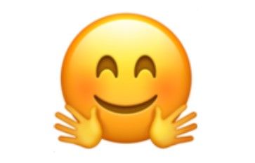 Emoji tersenyum dengan tangan terbuka.