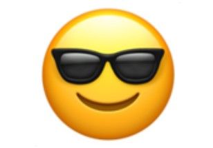 Emoji wajah tersenyum dengan kacamata hitam.