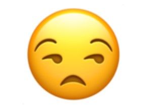 Emoji wajah tidak senang.