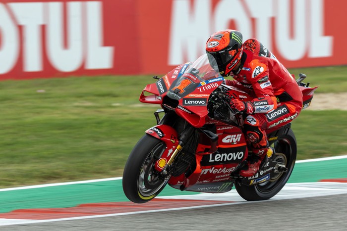 AUSTIN, TX - APRIL 14: Francesco Bagnaia (1) of Italy and Ducati Lenovo Team pops a wheelie while speeding away from turn 11 during Free Practice 2 of the MotoGP Red Bull Grand Prix of the Americas on April 14, 2023, at Circuit of The Americas in Austin, Texas. (Photo by David Buono/Icon Sportswire via Getty Images)