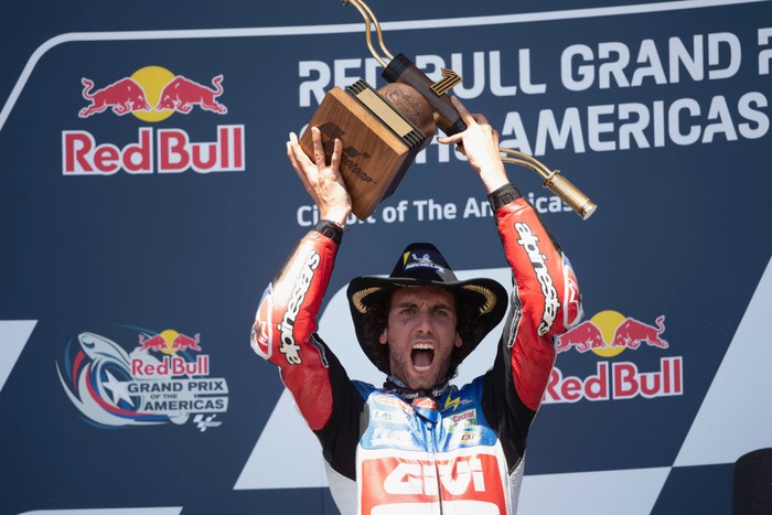 AUSTIN, TEXAS - APRIL 16: Alex Rins of Spain and LCR Honda Castrol celebrates the victory on the podium  at the end of the MotoGP race during the MotoGP Of The Americas - Race on April 16, 2023 in Austin, Texas. (Photo by Mirco Lazzari gp/Getty Images)