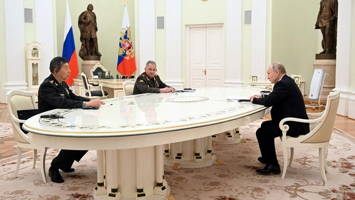 Russian President Vladimir Putin, Defence Minister Sergei Shoigu and Chinese Defence Minister Li Shangfu attend a meeting in Moscow, Russia, April 16, 2023. Sputnik/Pavel Bednyakov/Pool via REUTERS
