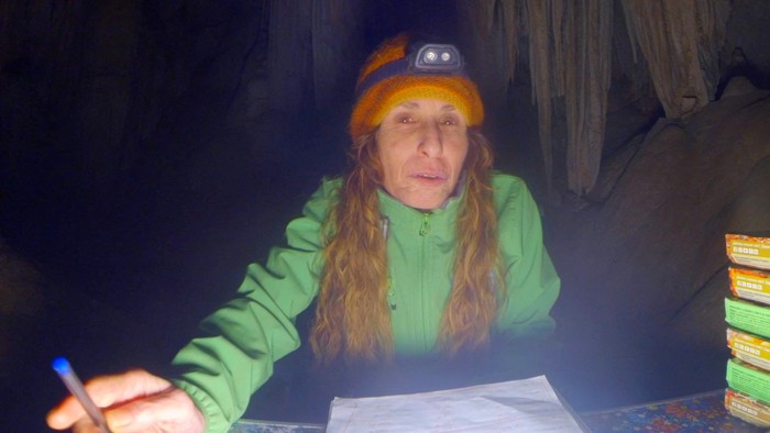 Beatriz Flamini, a Spanish mountaineer who has been isolated for 500 days in a cave is pictured during her daily life at the cave in Motril, Spain in this screen grab taken from a handout video from November 2021. Dokumalia Producciones/Handout via REUTERS.  THIS IMAGE HAS BEEN SUPPLIED BY A THIRD PARTY. MANDATORY CREDIT. NO RESALES. NO ARCHIVES