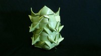 Ketupat ini bentuk ya seperti buah nanas dengah mahkota di bagian atasnya. Ketupat ini dapat diisi beras dalam jumlah yang banyak. Foto: Instagram/Twitter